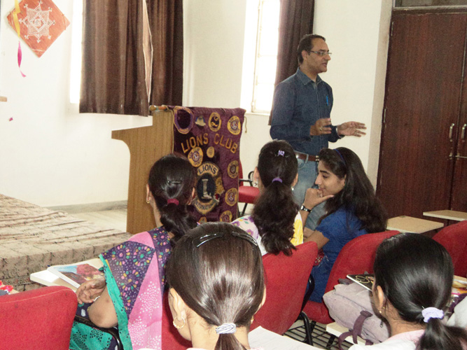Addressing Students About Road Safety in a College in Udaipur